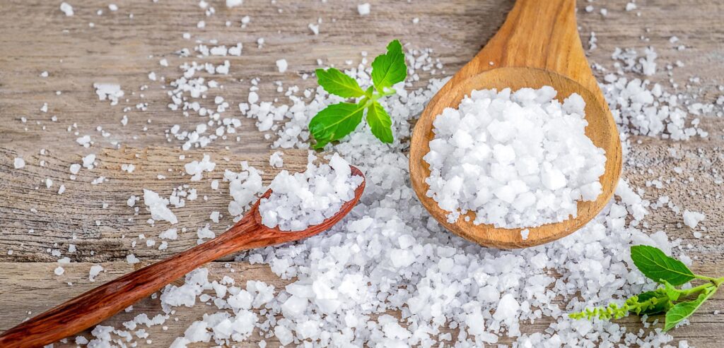 Natural salt from the sea on the dining table Stock Free