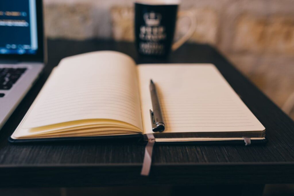 Notepad, MacBook and Coffee Mug Stock Free