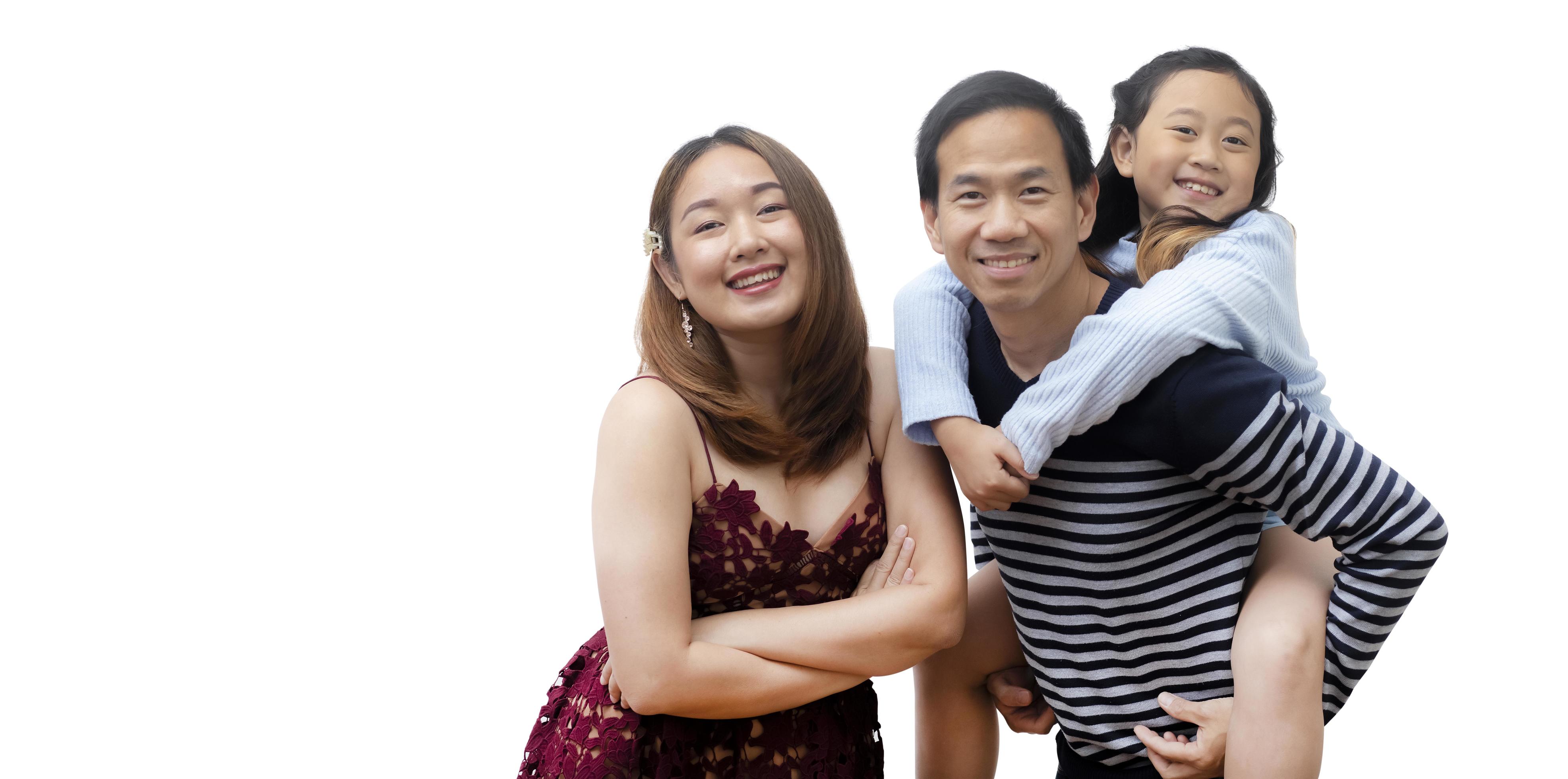 Asian family woman and a man with little junior woman smiling and fun isolated over white background Stock Free