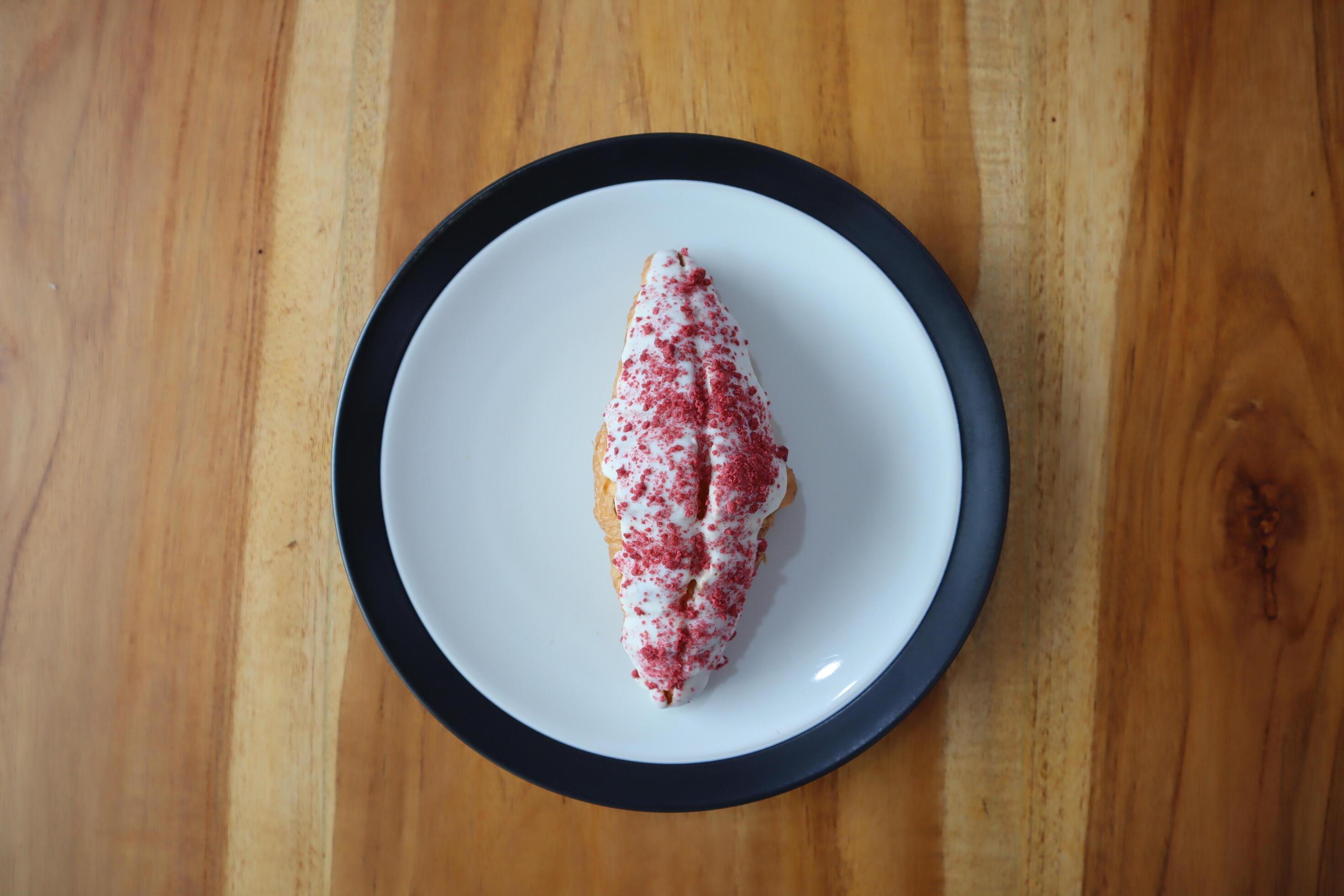 Strawberry Croissant on table background Stock Free