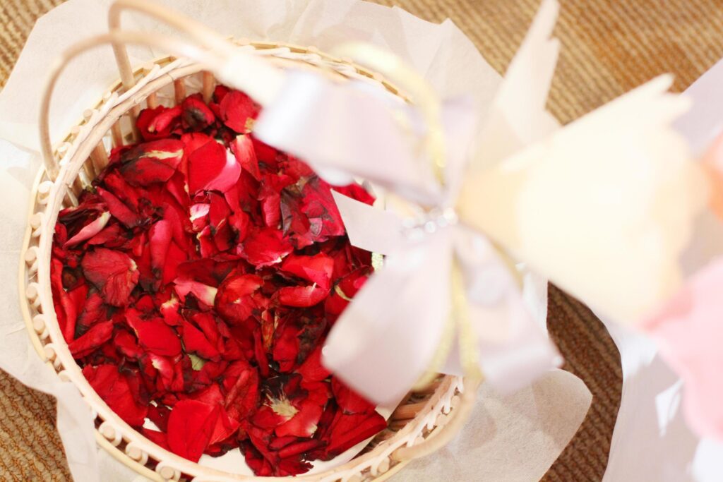 Beautiful red Rose petals Flowers in basket decorated in wedding ceremony Stock Free