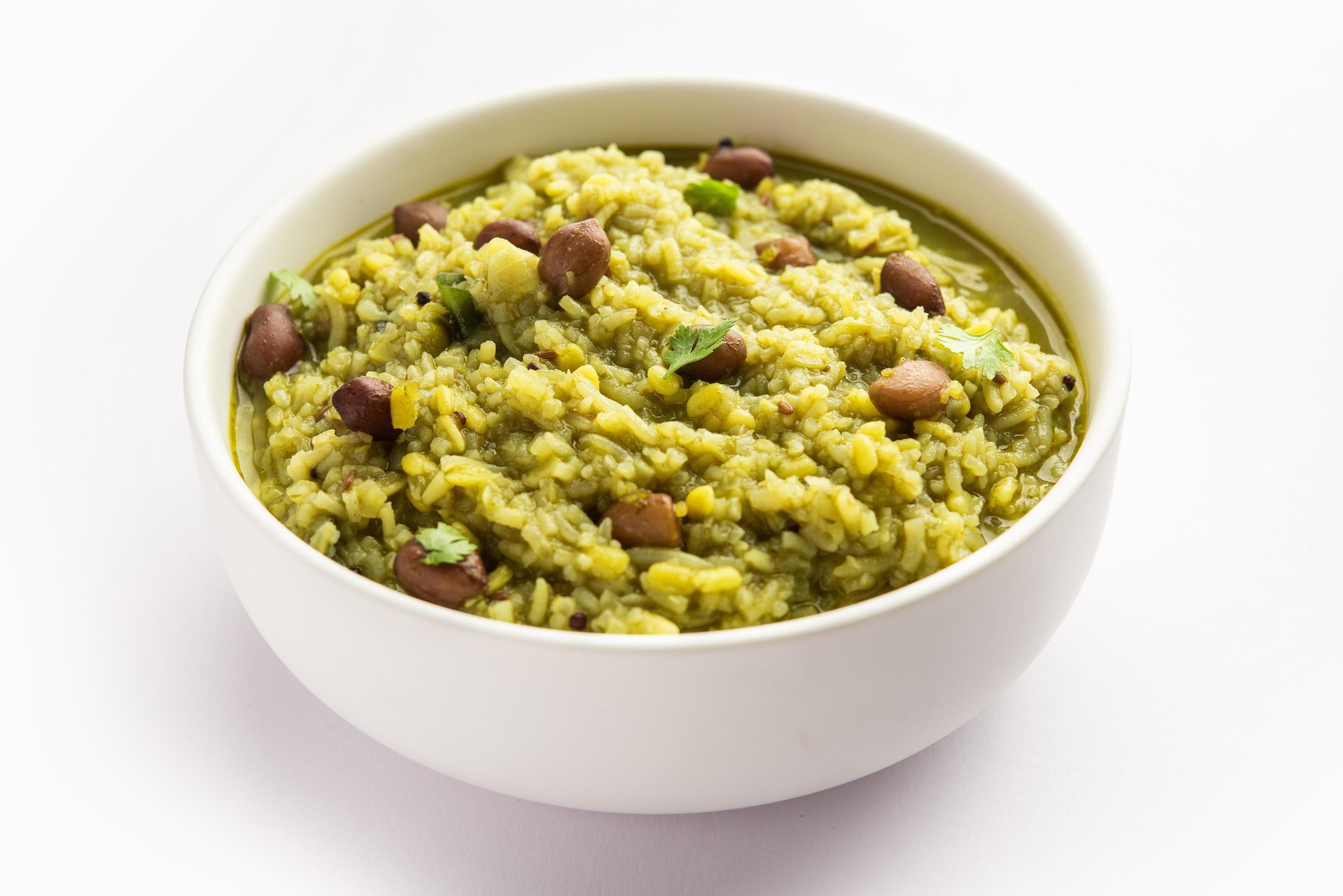 Palak khichdi is a one pot nutritious meal of mung lentils and rice with spinach, Indian food Stock Free