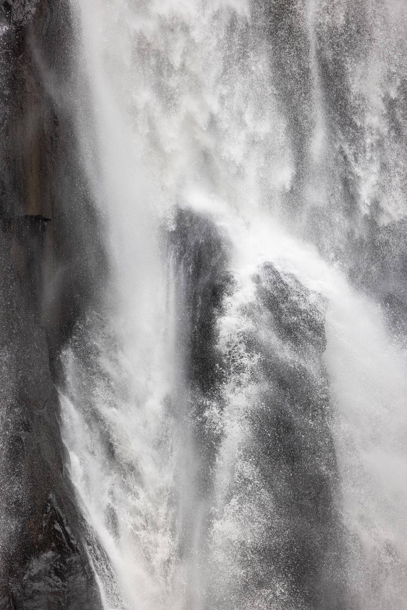 A natural waterfall in a big forest in the midst of beautiful nature. Stock Free