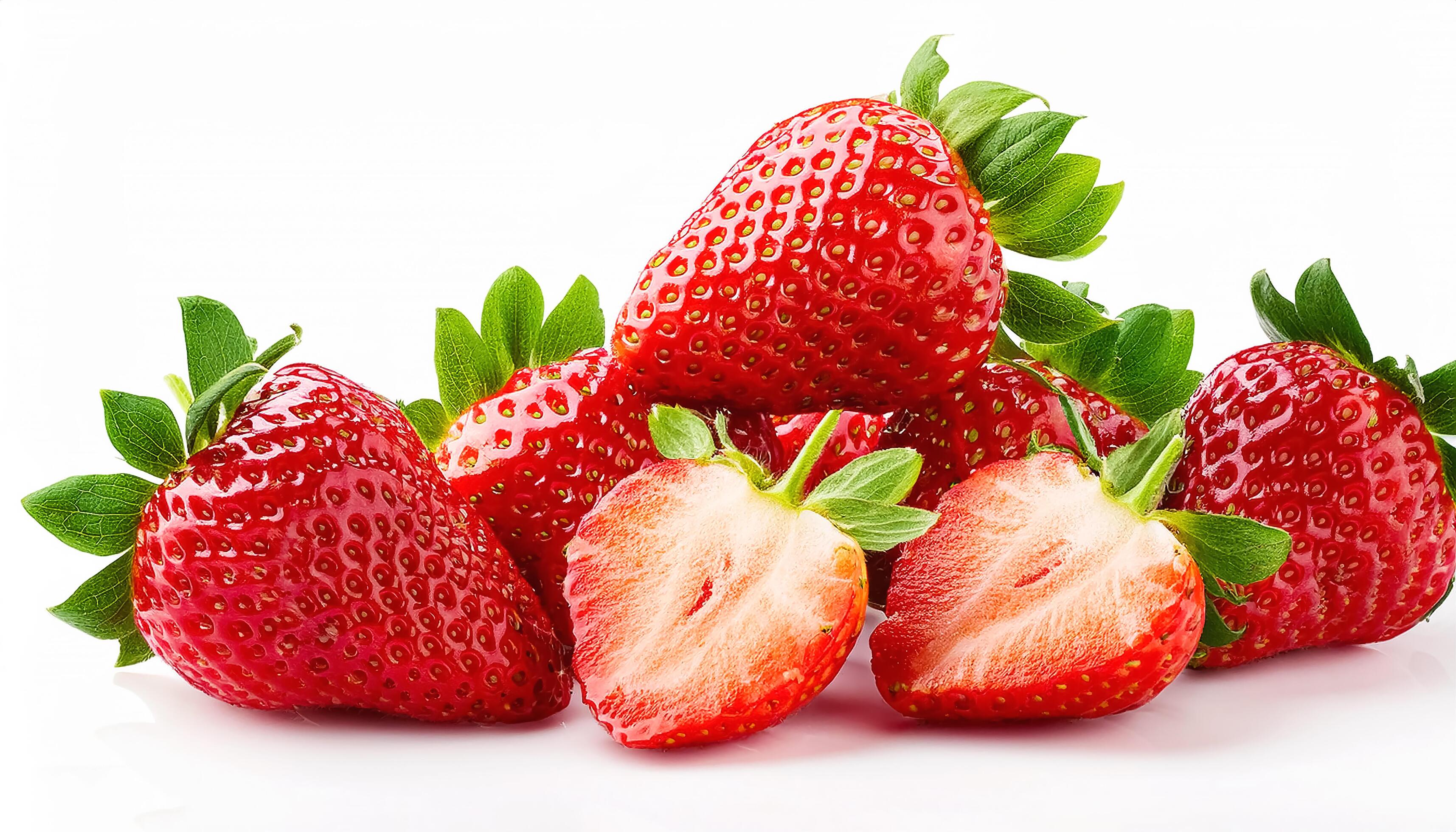 Fresh a pile sweet Strawberry slice and whole isolated on white background. Stock Free