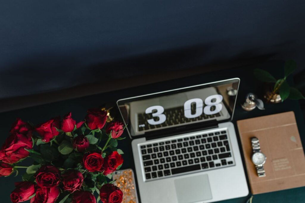 Office Desk Table With Red Roses Stock Free