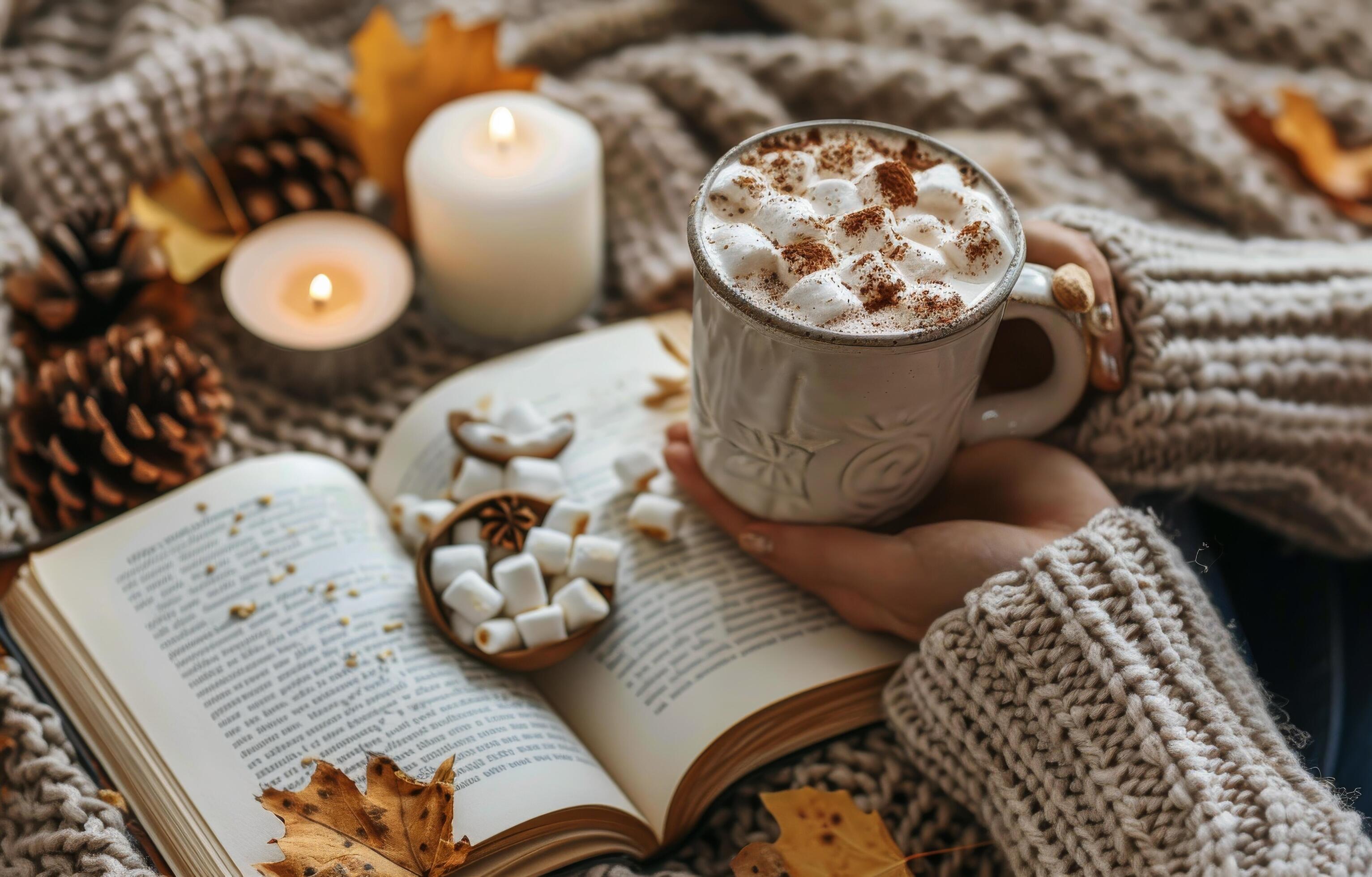 Cozy Autumn Evening With Hot Chocolate, Book, and Candles Stock Free