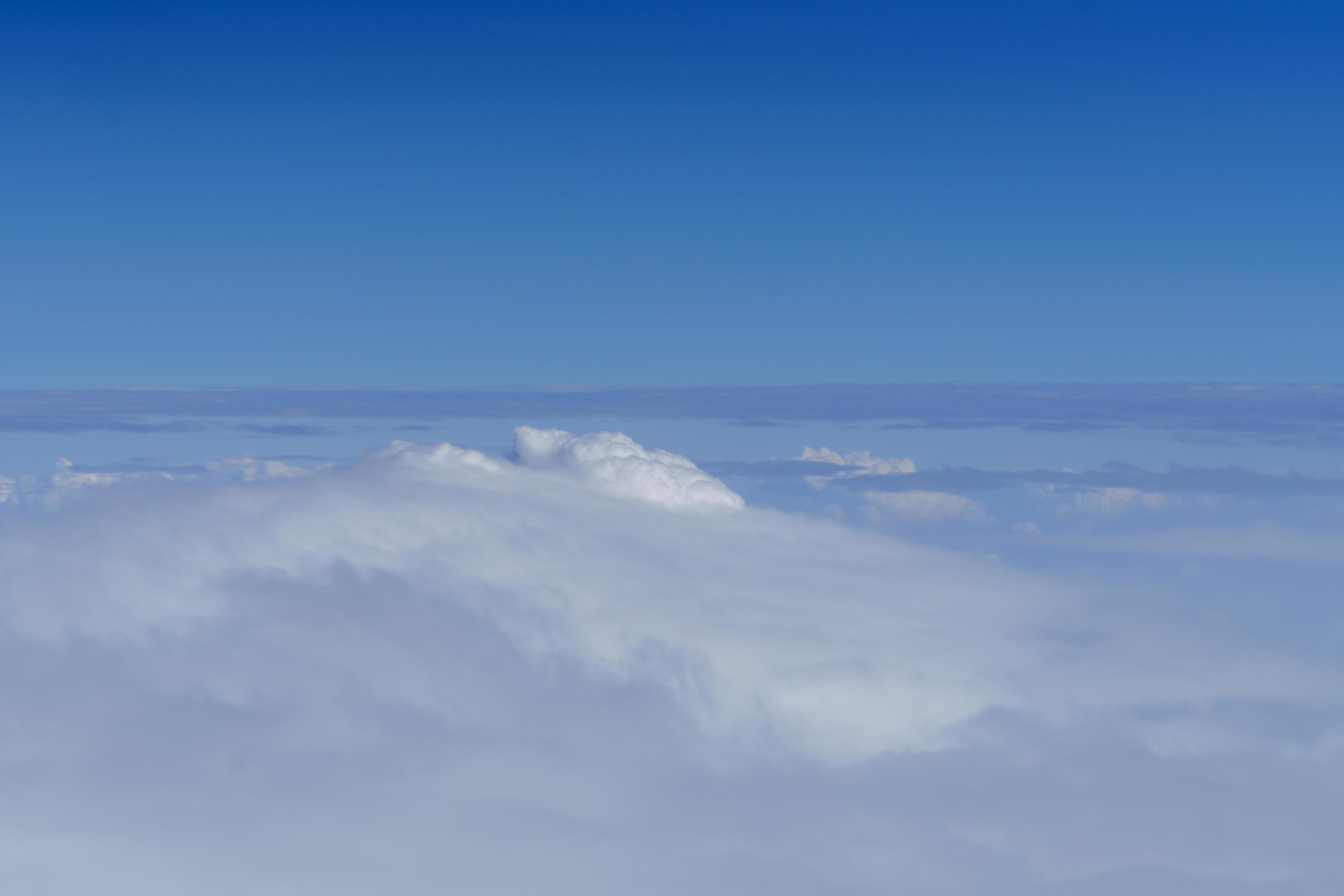 Nature view of blue sky with fluffy white cloud using for wallpaper page, background or wallpaper Stock Free