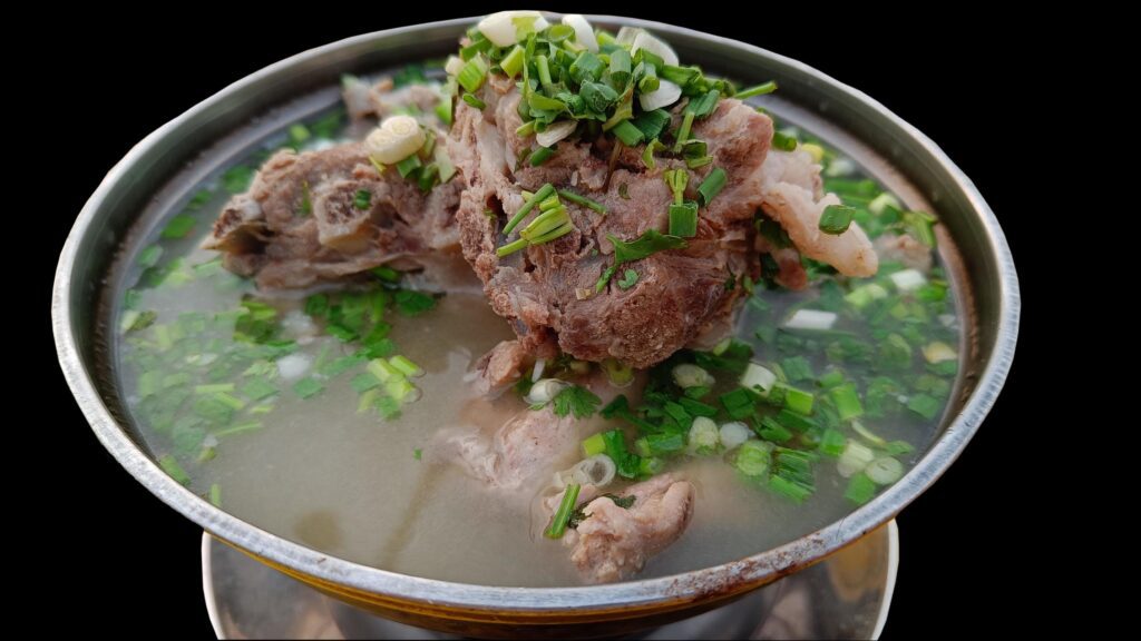 Close up Thai food, spicy pork bone soup black background Stock Free