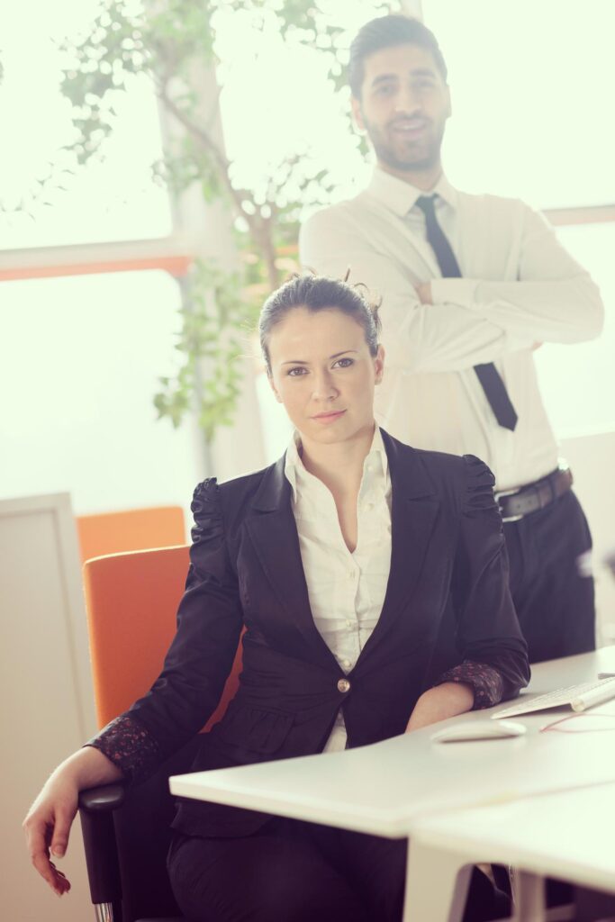 portrait of business couple at office Stock Free