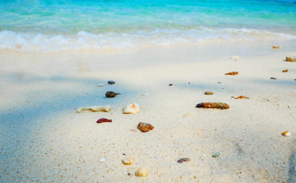 Beautiful beach and blue sea on the beach with rock on sand island natural ocean Stock Free