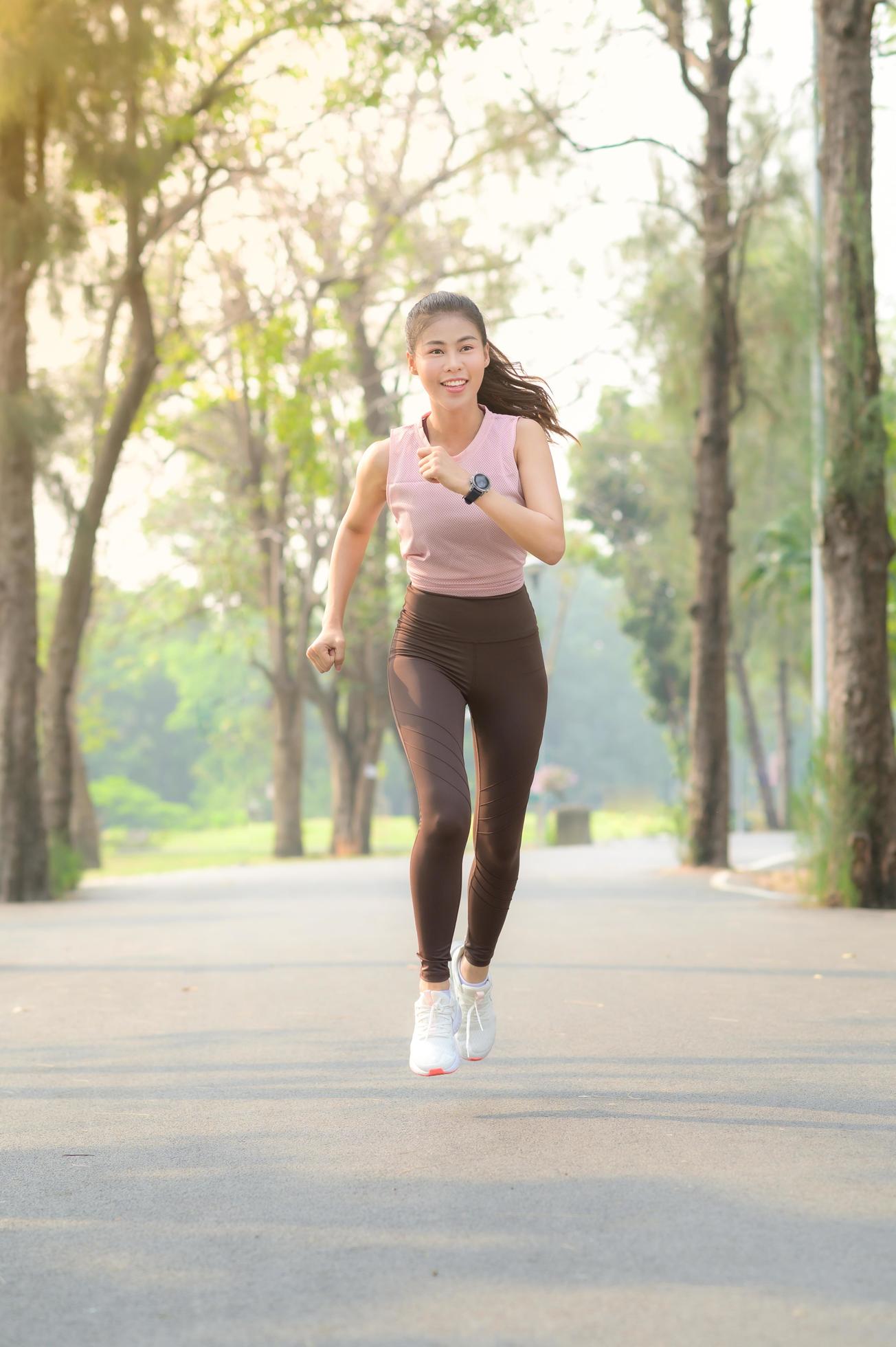 Beautiful Asian women exercise in the park every morning, It is a lifestyle for relaxation and good health of the body Stock Free