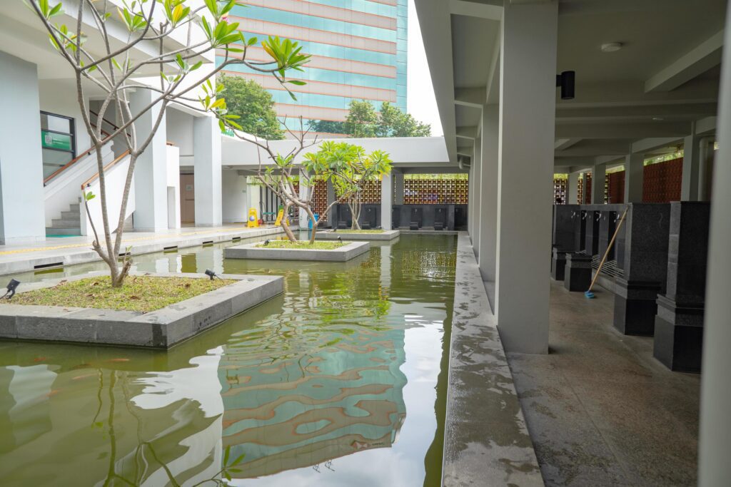 Interior agung mosque wudhu area, water fountain and roof. The photo is suitable to use for Ramadhan poster and Muslim content media. Stock Free