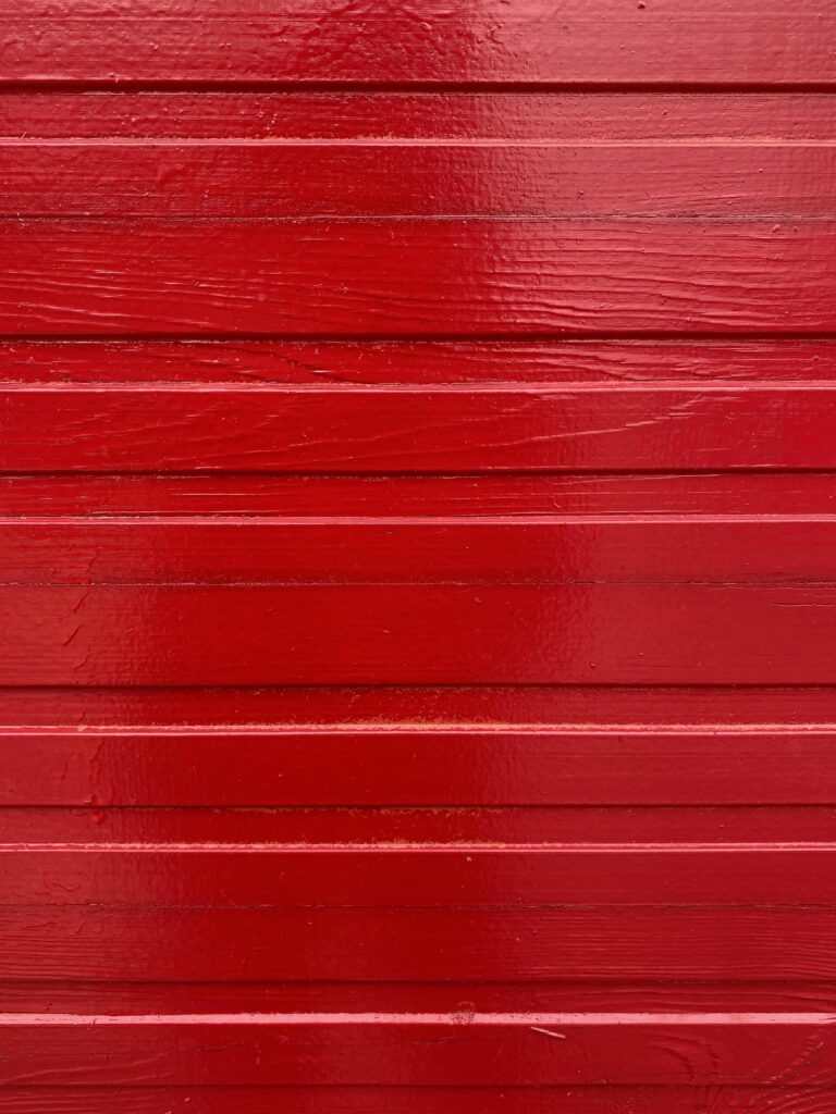 close up of red wooden wall background Stock Free