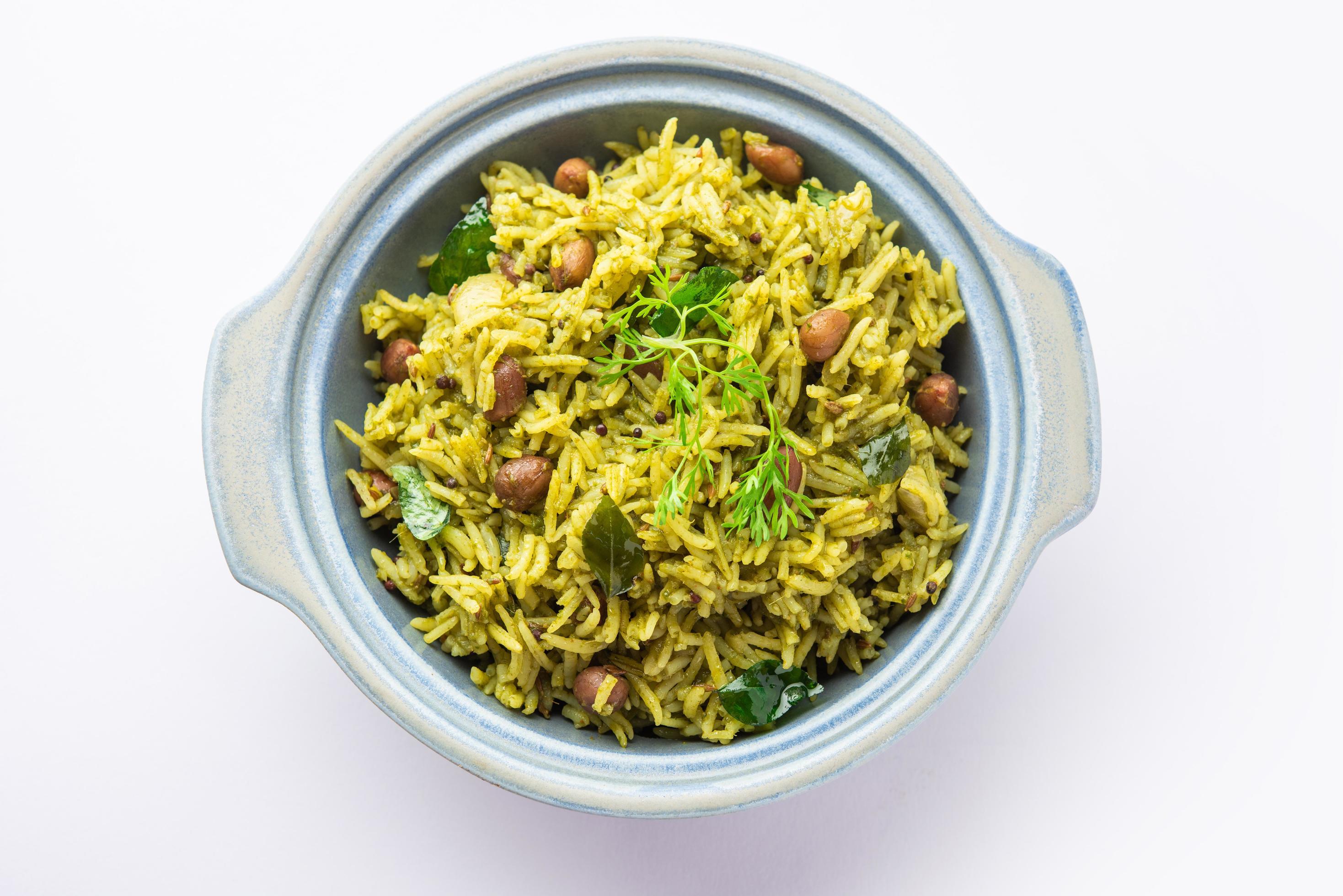 Palak khichdi is a one pot nutritious meal of mung lentils and rice with spinach, Indian food Stock Free