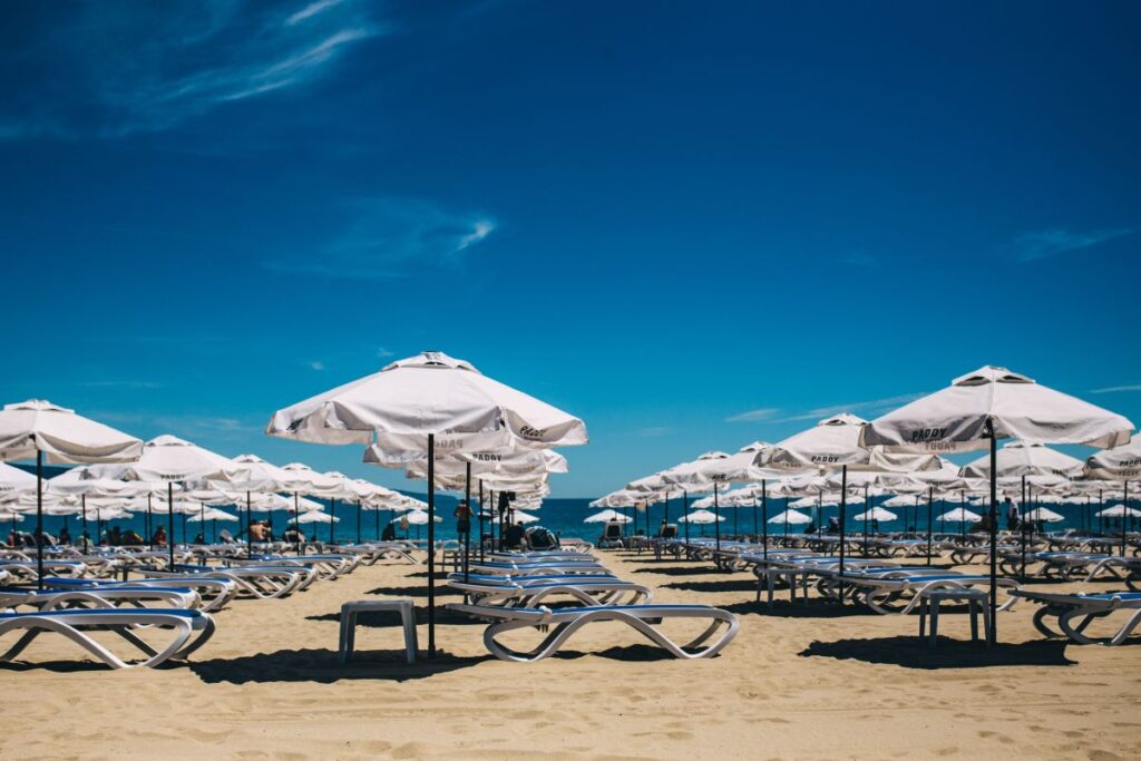 Umbrellas and lounge chairs on Sunny Beach, Bulgaria Stock Free