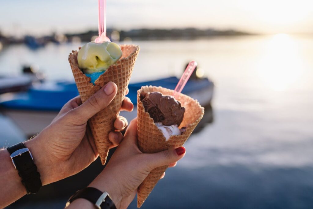 Man and Woman Holding Ice Creams Stock Free