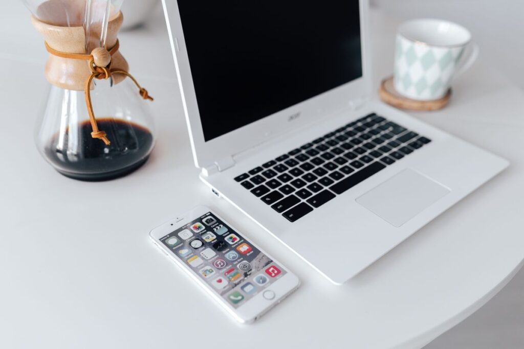 Workplace with laptop on table at home Stock Free