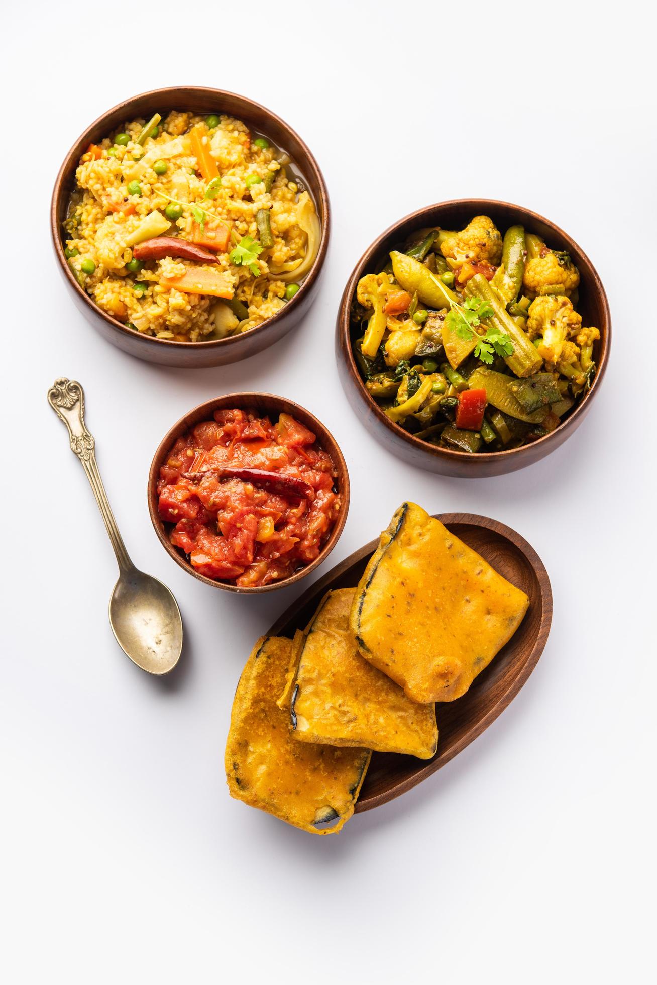 Bengali Bhog food for Indian Hindu Durga Puja or pooja festival. Khichadi, labra, tomato chutney Stock Free