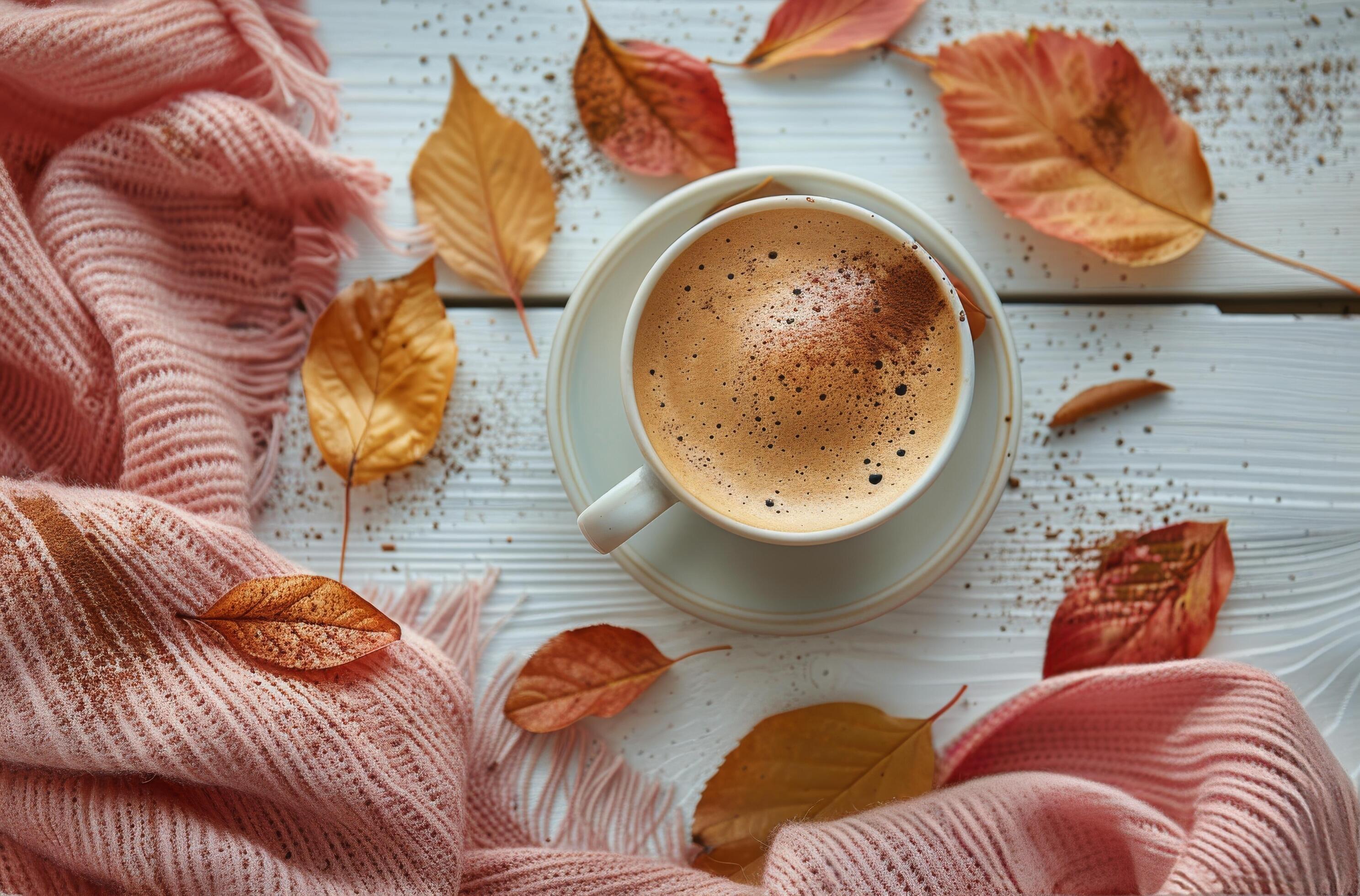 Warm Latte With Autumn Leaves and Blanket on White Wooden Table Stock Free