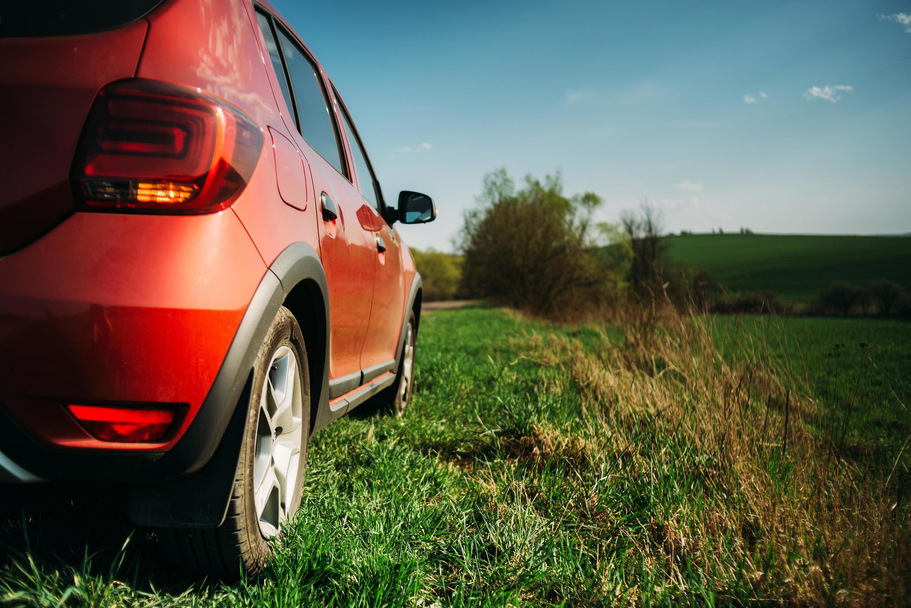 Red car in the countryside Stock Free