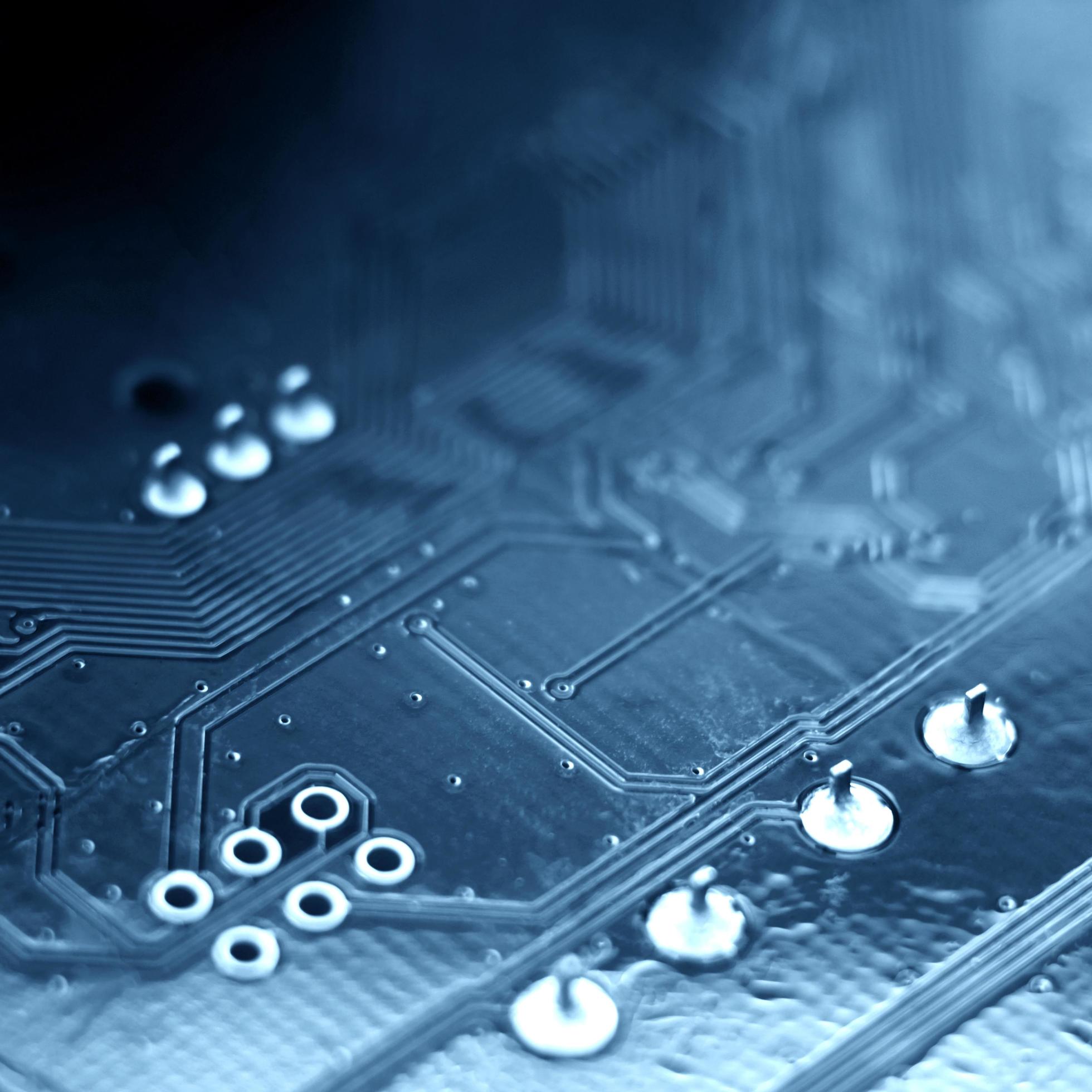 Close up image of a circuit board in blur. Stock Free