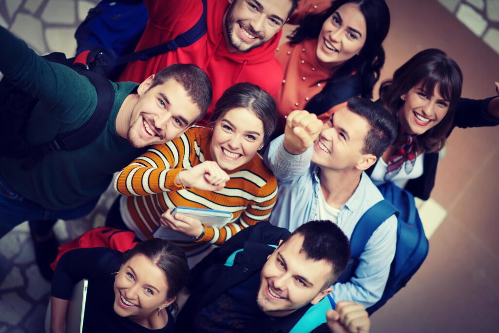 group of happy young people showing their unity. Stock Free