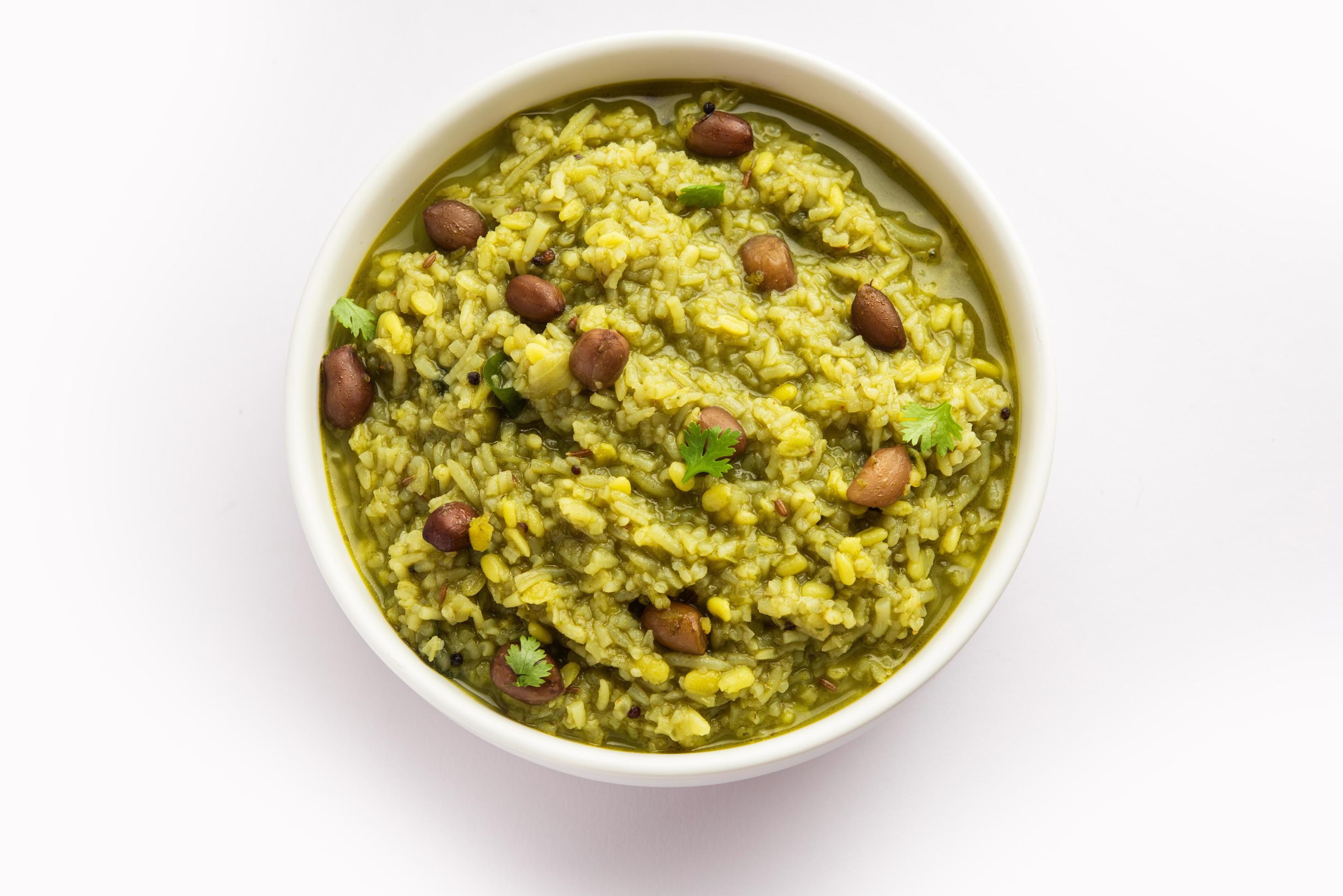 Palak khichdi is a one pot nutritious meal of mung lentils and rice with spinach, Indian food Stock Free