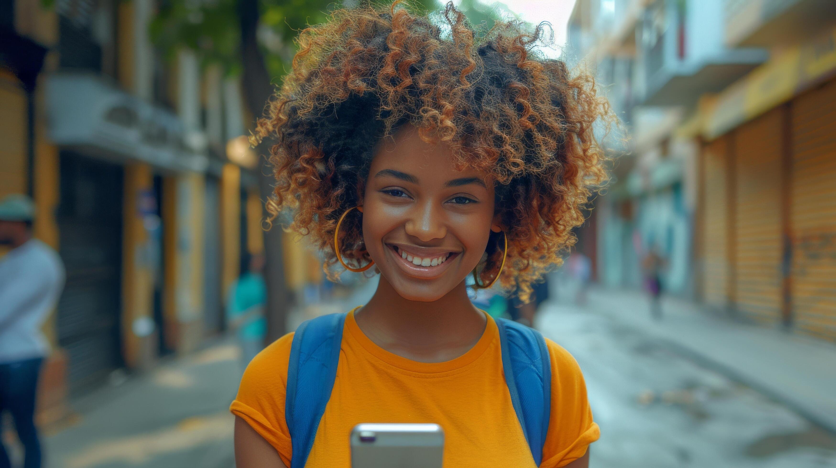 Smiling Woman With Dreadlocks Using Cell Phone Stock Free