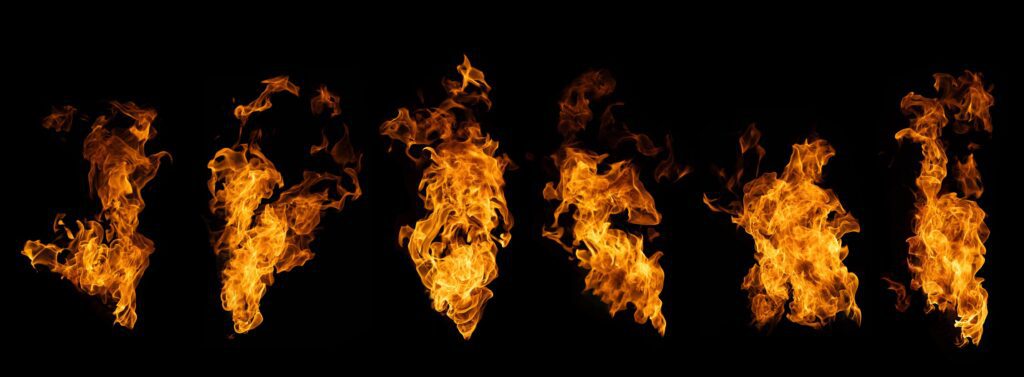 The set of fire and burning flame isolated on dark background for graphic design Stock Free