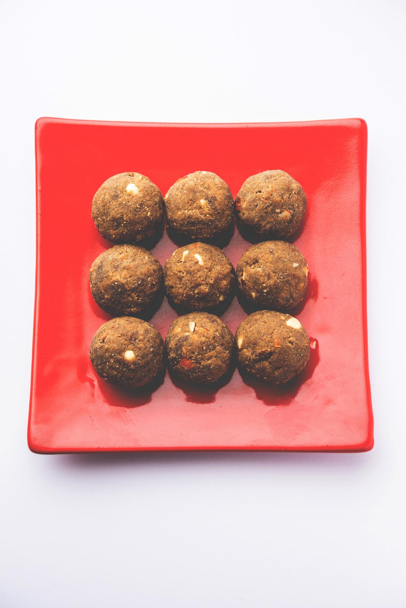 Bajra Atta Ladoo or kuler laddoo – Millet Flour Laddu, a popular winter sweet snack food from India Stock Free