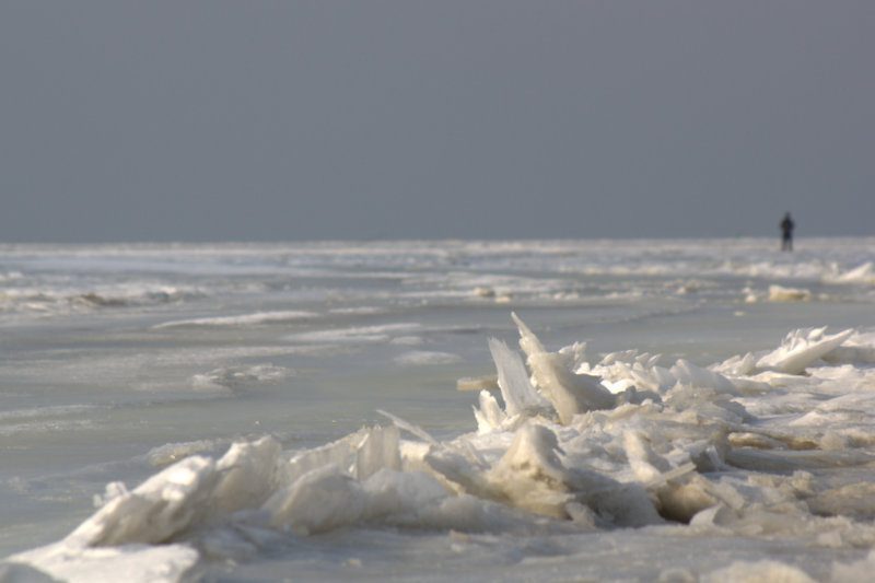 Man on drifting ice at Noordpolderzijl Stock Free