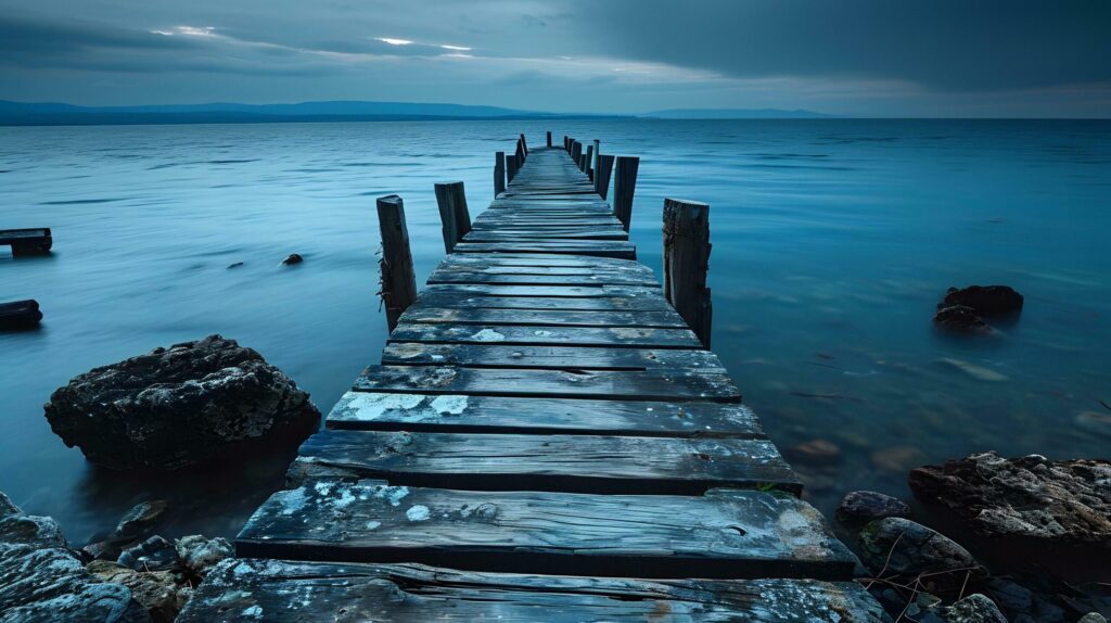 Serene Twilight at the Old Seaside Wooden Pier Free Photo