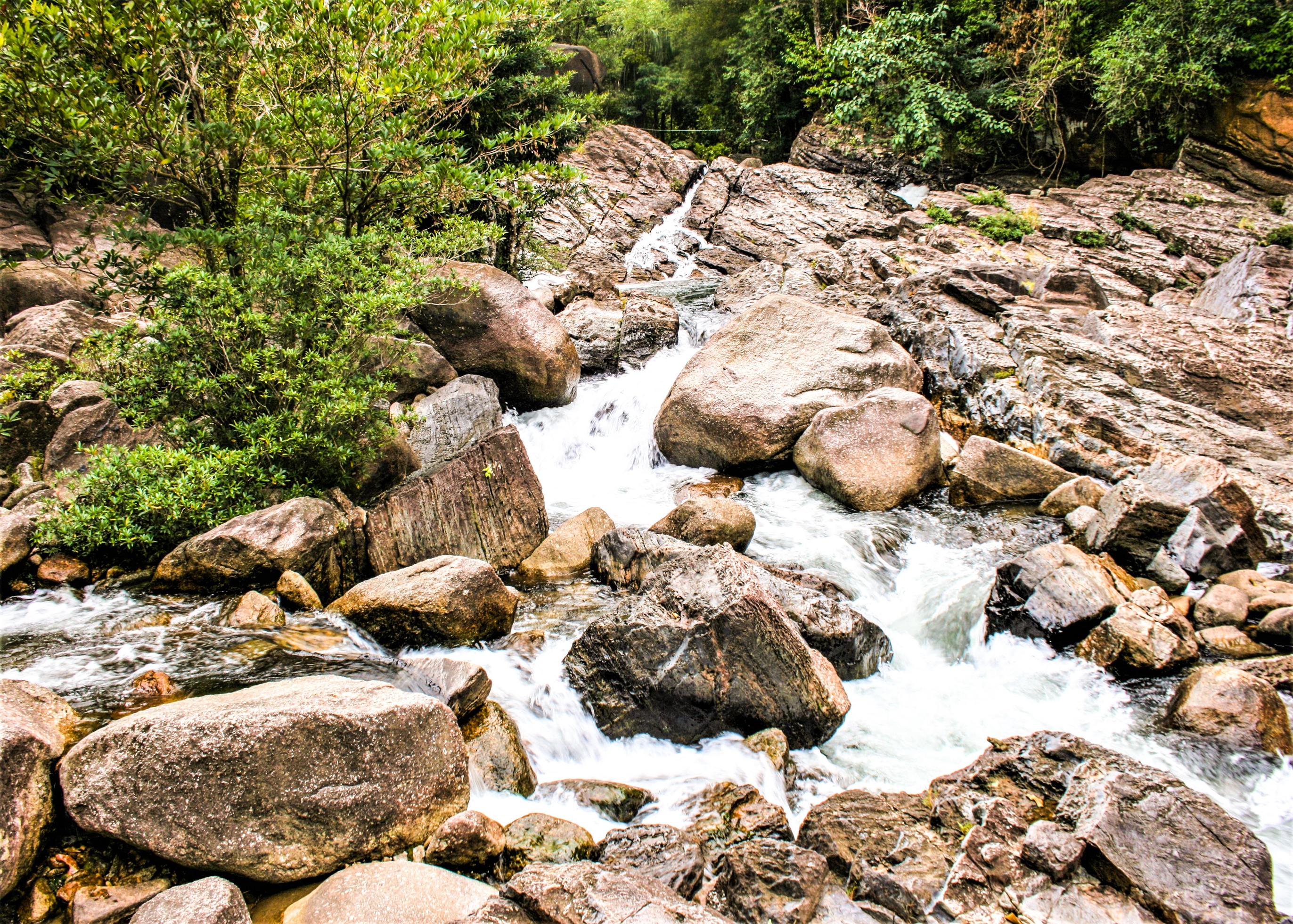 big stone rock waterfall beauty nature in south Thailand Stock Free