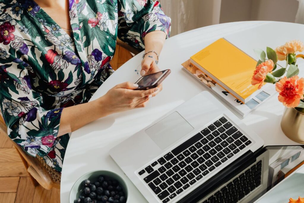 A woman works on a laptop at home Stock Free