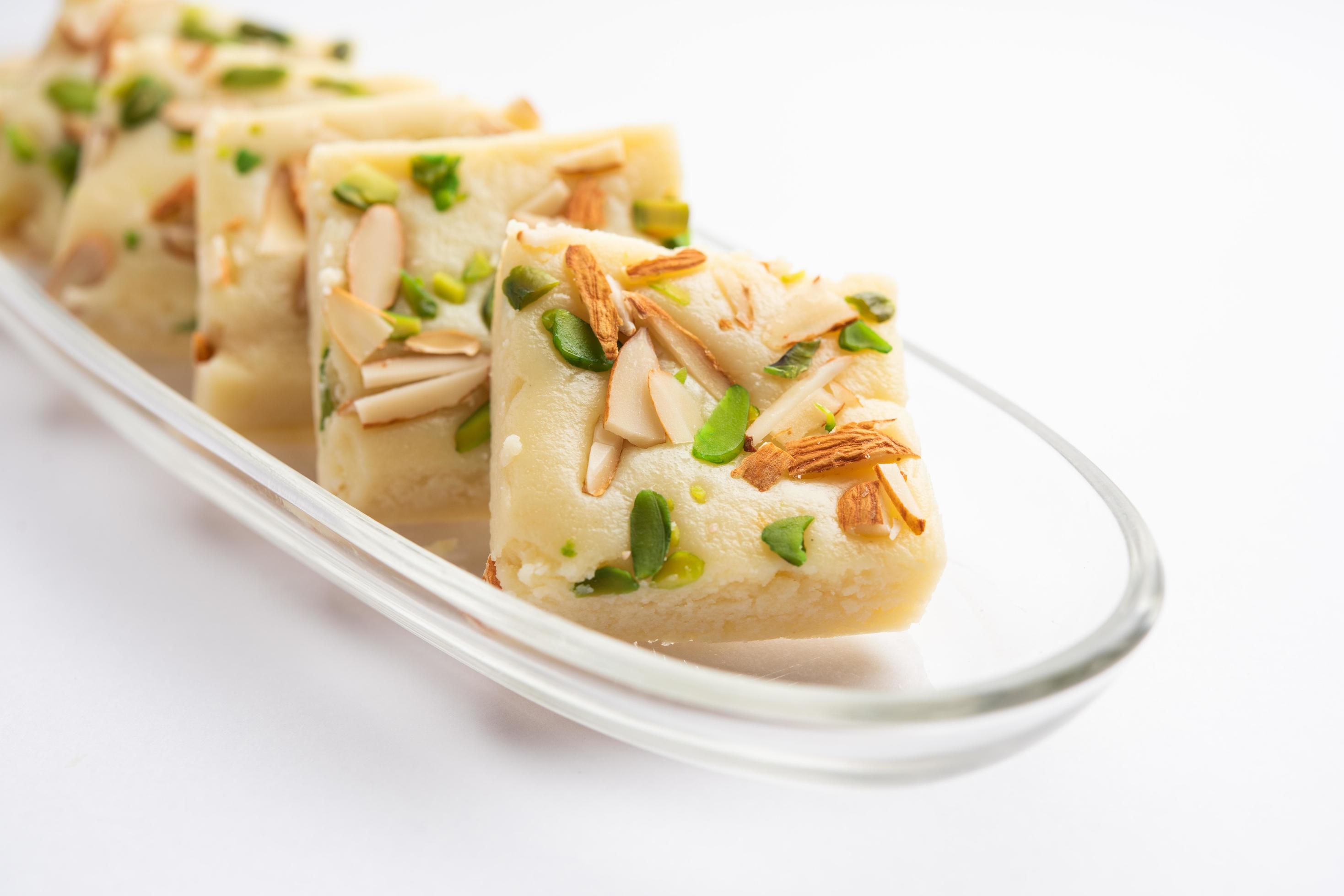 Milk powder barfi also known as Mava burfi, white Khoya burfi or Barfee, Indian Sweet food Stock Free