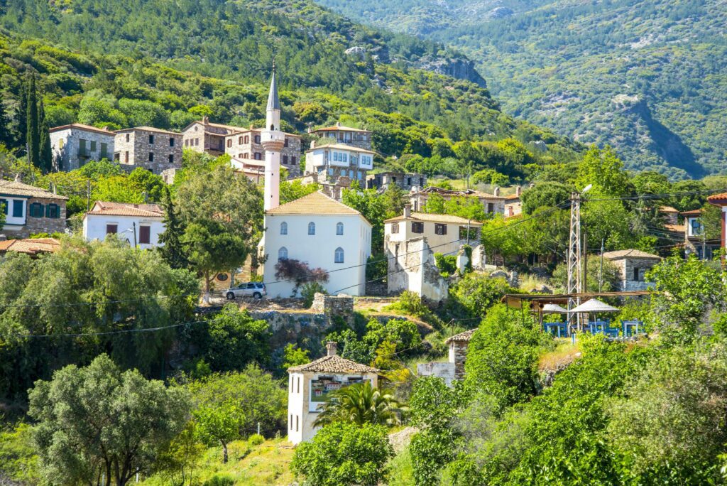 The landscape of Doganbay village and stone house on a summer and sunny day. Stock Free