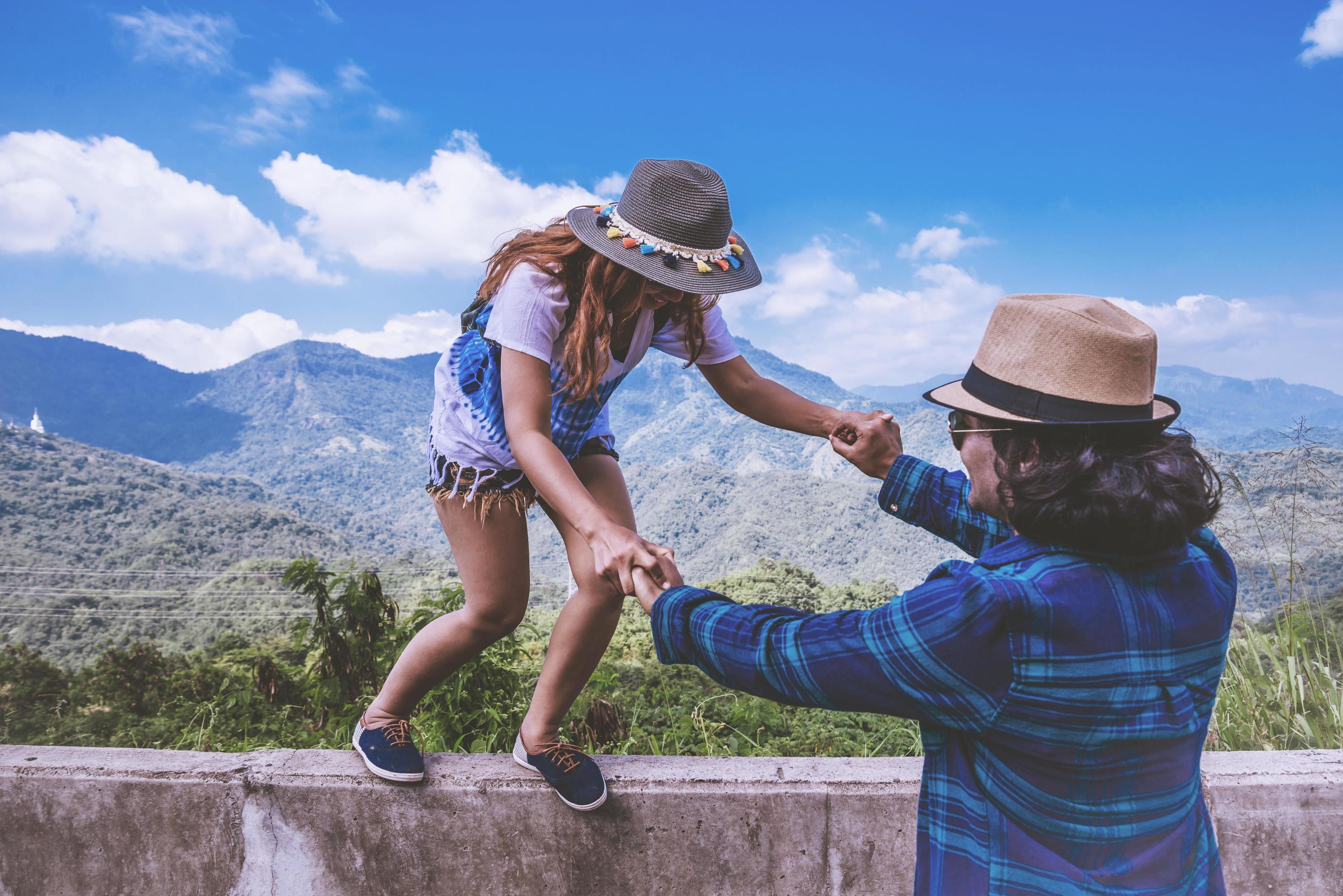 Lover women and men asians travel relax in the holiday. Lovers walk hand in hand nature on the Moutain. Thailand Stock Free