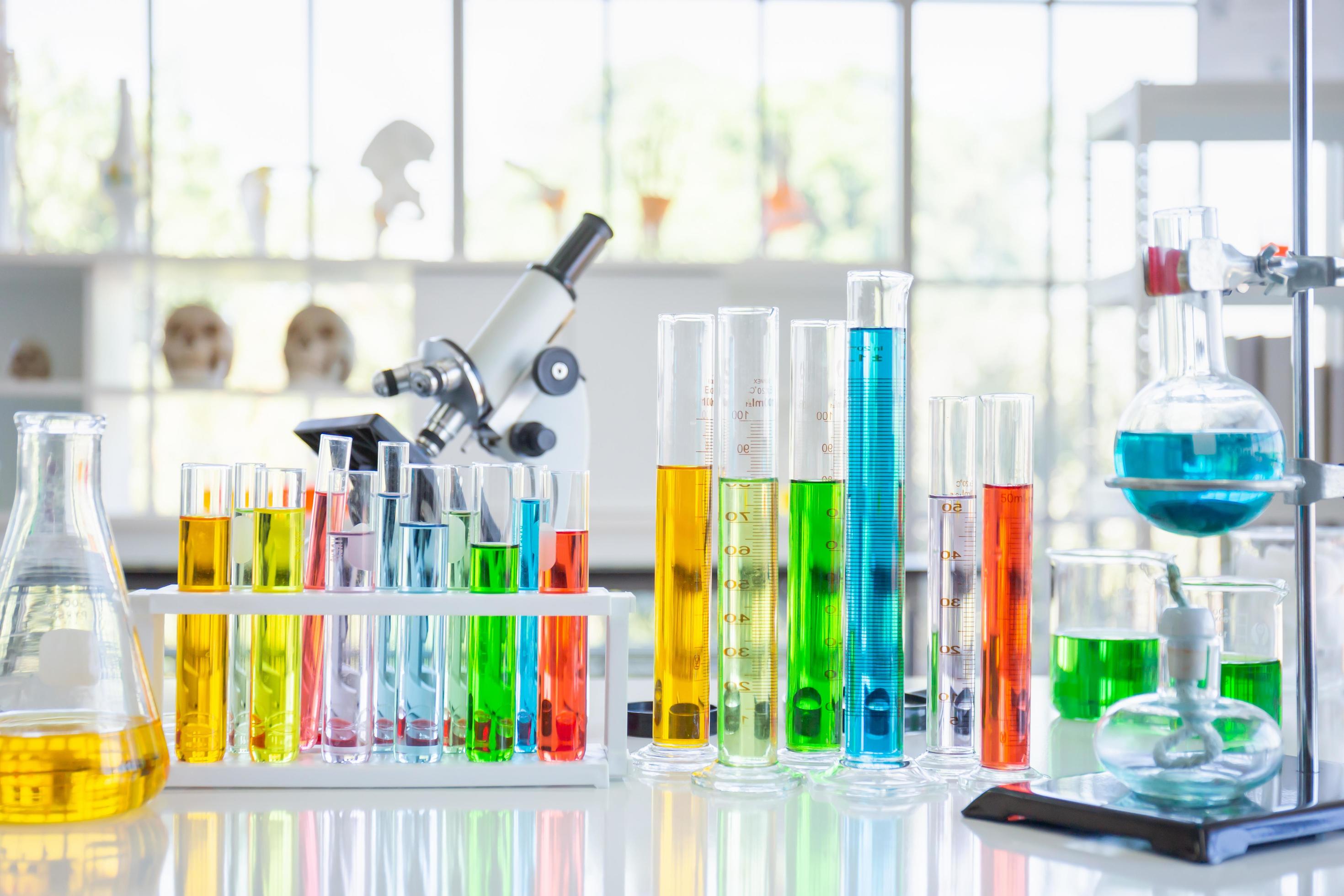 Various glass tubes and equipment used in scientific laboratories, on desks, in laboratories, try researching Stock Free