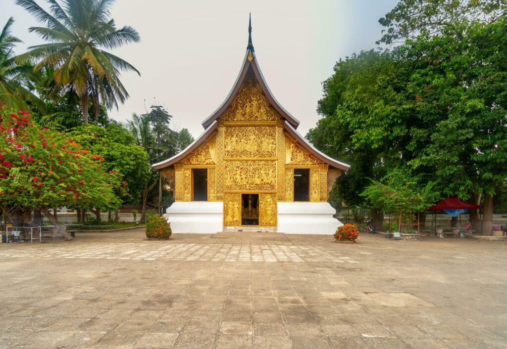 Wat Xieng Thong Golden City Temple in Luang Prabang, Laos. Xieng Thong temple is one of the most important of Lao monasteries. Stock Free