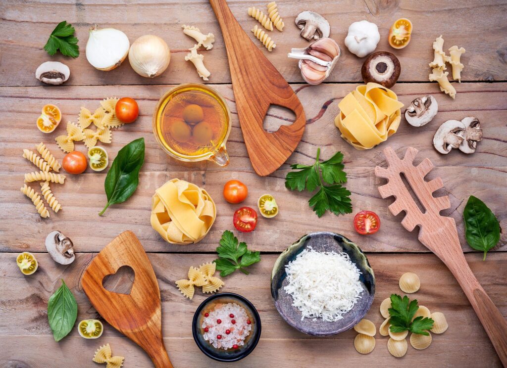 Top view of Italian food on light wood Stock Free