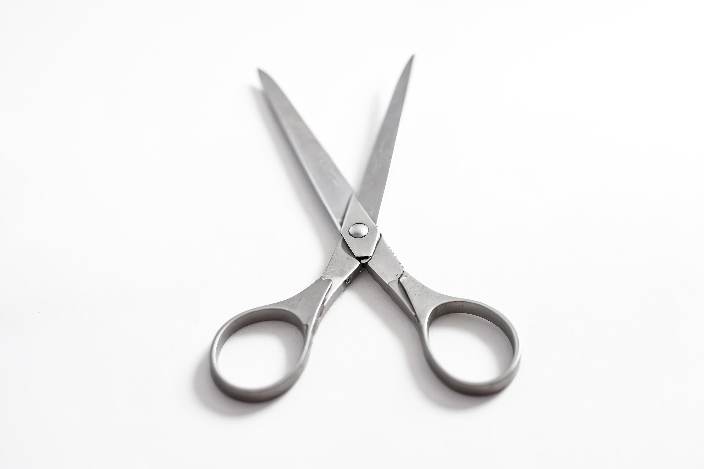 Close-up of Silver Scissors on a White Background Stock Free