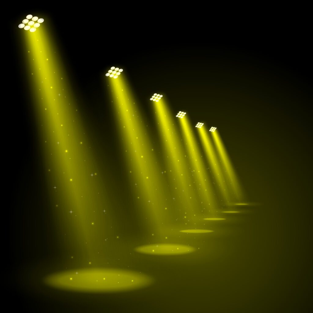 Golden spotlights shining background Free Vector