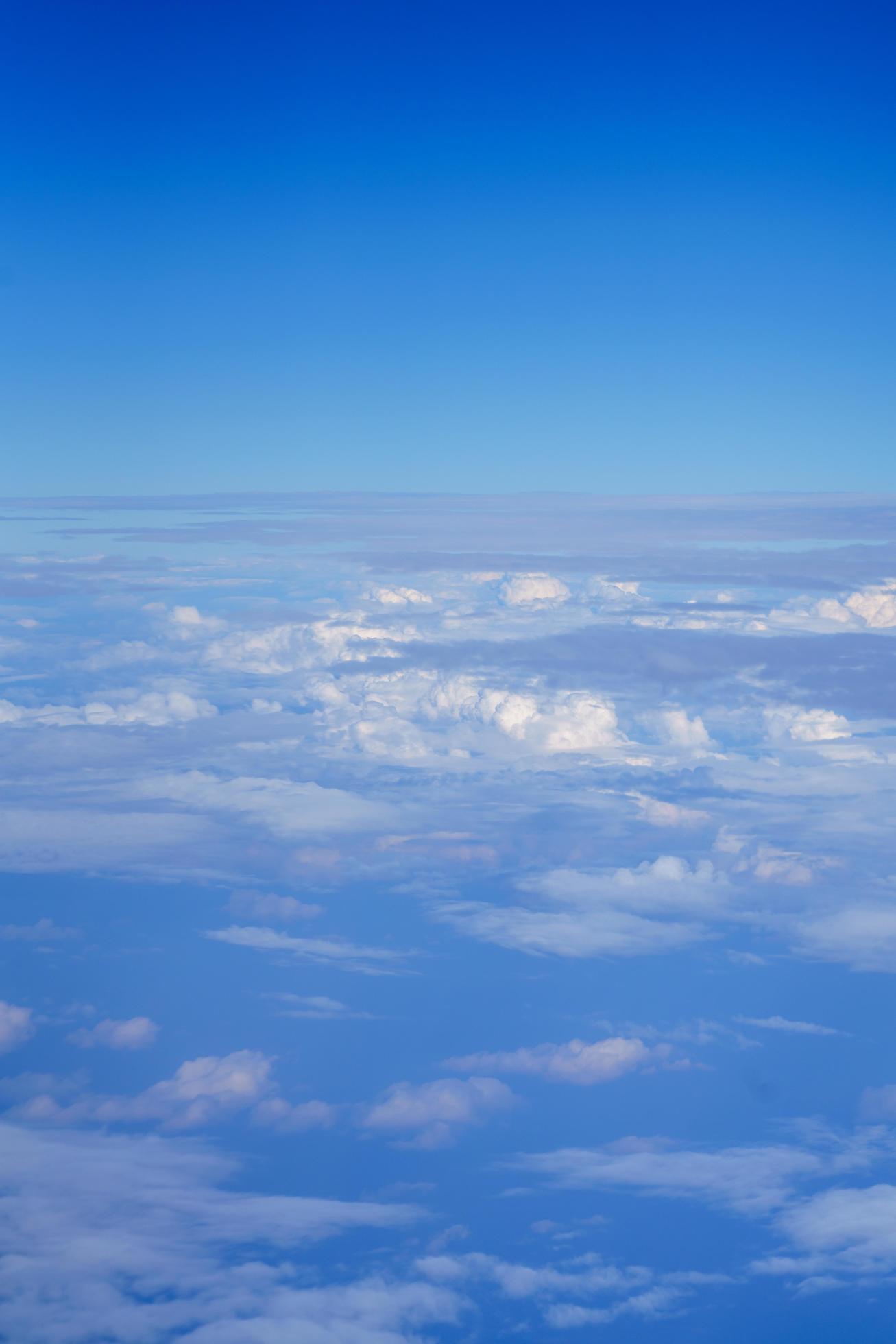 Nature view of blue sky with fluffy white cloud using for wallpaper page, background or wallpaper Stock Free