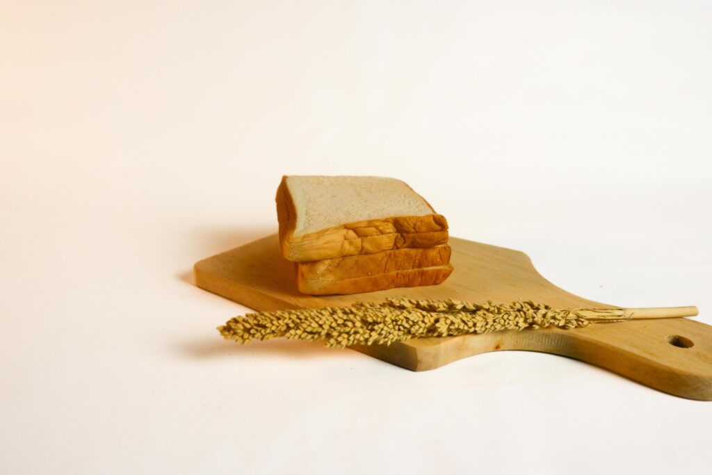 photography of bread with wheat on a white background Stock Free