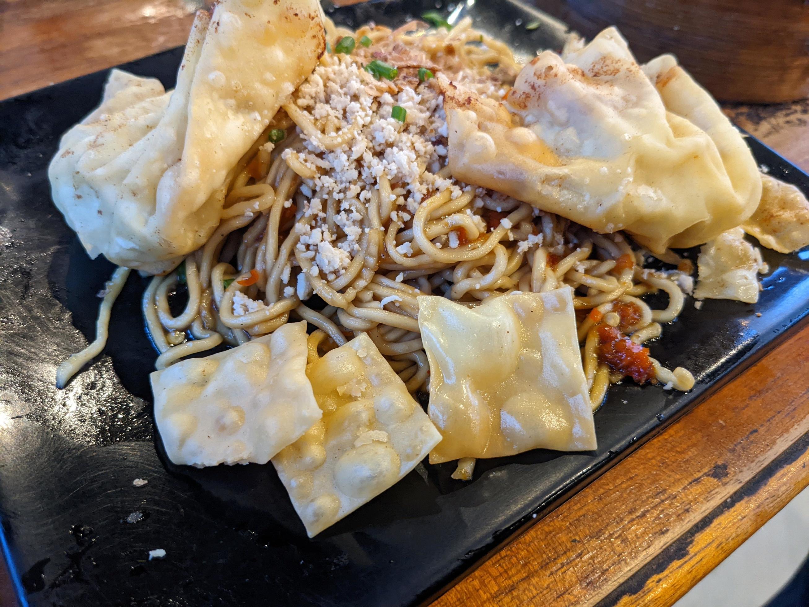 Close up photo of traditional spicy noodle from Indonesia. The photo is suitable to use for traditional food background, poster and food content. Stock Free