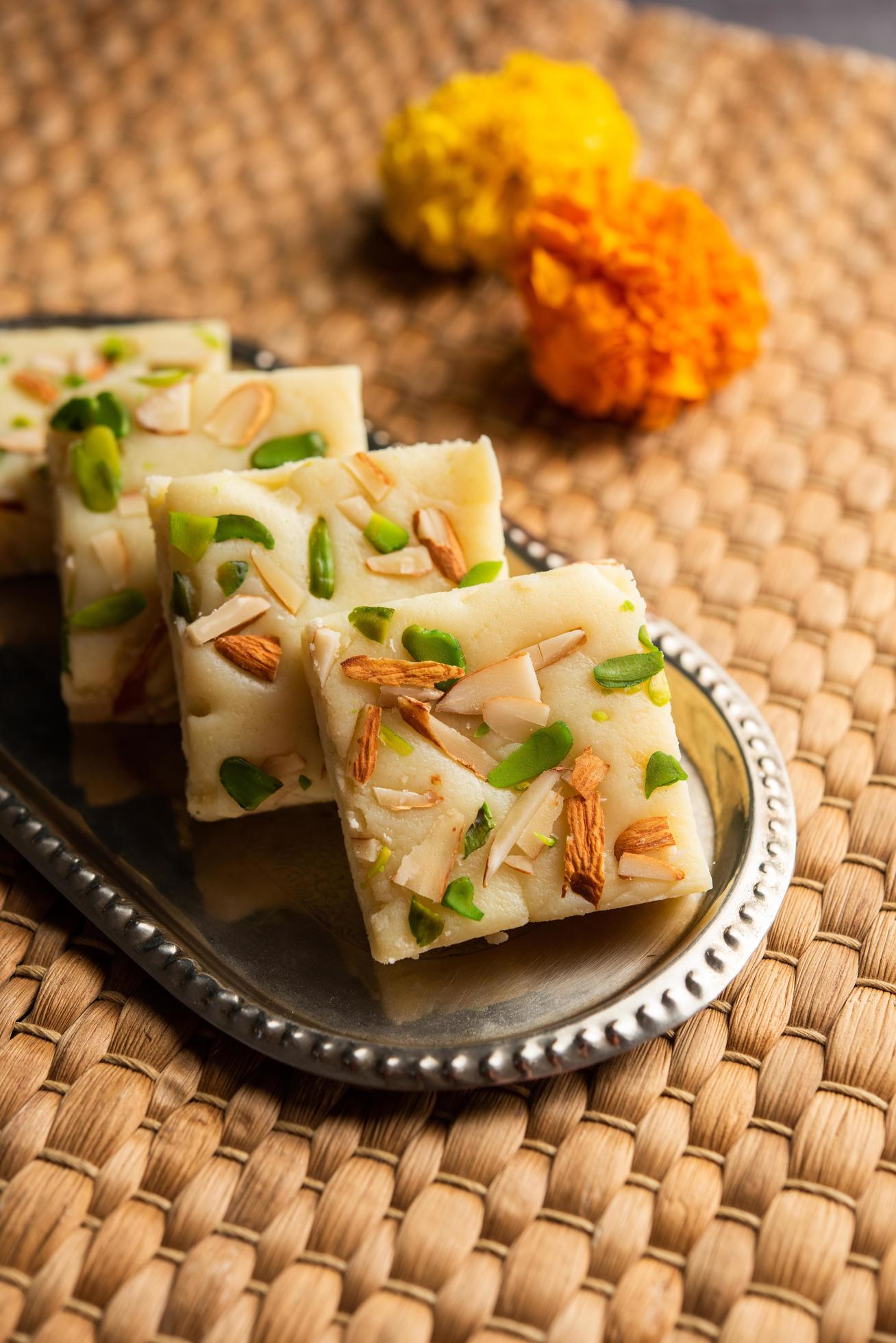 Milk powder barfi also known as Mava burfi, white Khoya burfi or Barfee, Indian Sweet food Stock Free