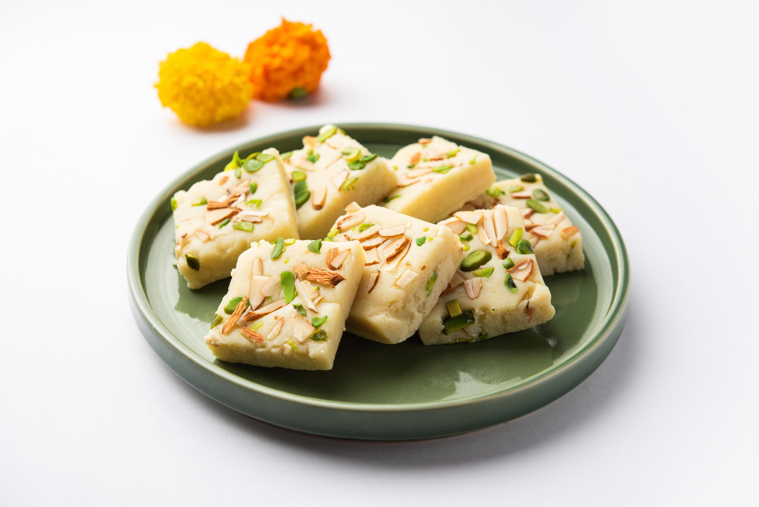 Milk powder barfi also known as Mava burfi, white Khoya burfi or Barfee, Indian Sweet food Stock Free