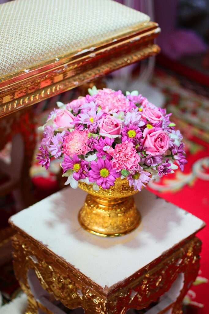 Beautiful flowers decoration on Engagement gold bowl for Thai engagement ceremony.Thai wedding culture tradition Stock Free