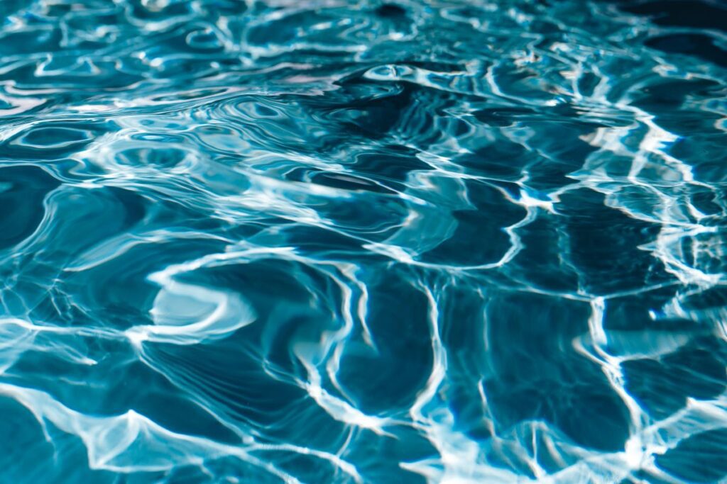 Wavy water surface in a swimming pool Stock Free