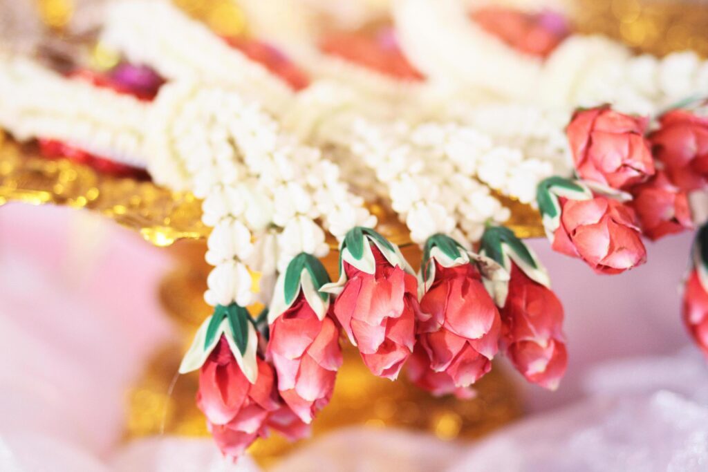 Flower garlands on a gold tray in tradition Thai wedding ceremony day. Jasmine garland Stock Free